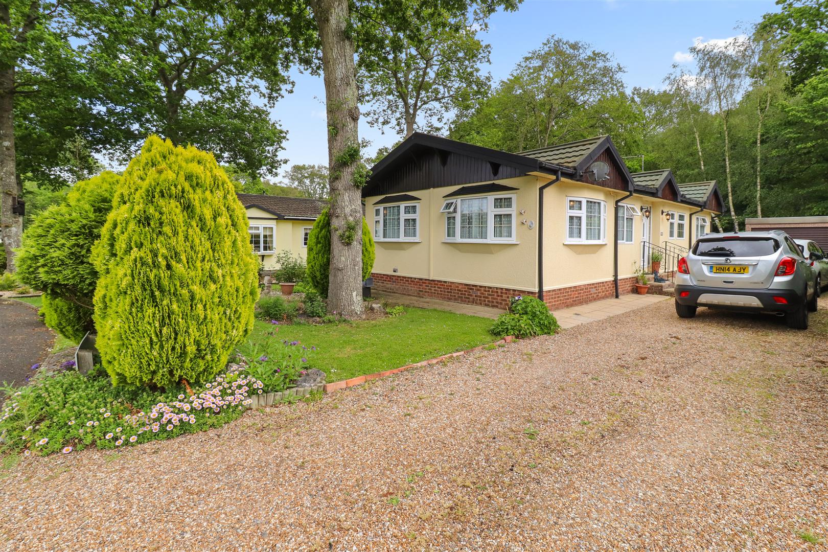 Property Details for Badgers Walk Deanland Wood Park BN27 3UT